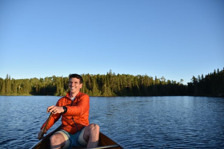 Eric in a canoe on a lake