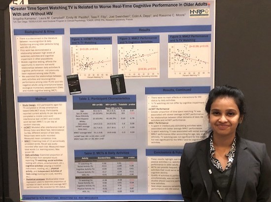 2019 NAN Conference - Snigdha standing next to poster