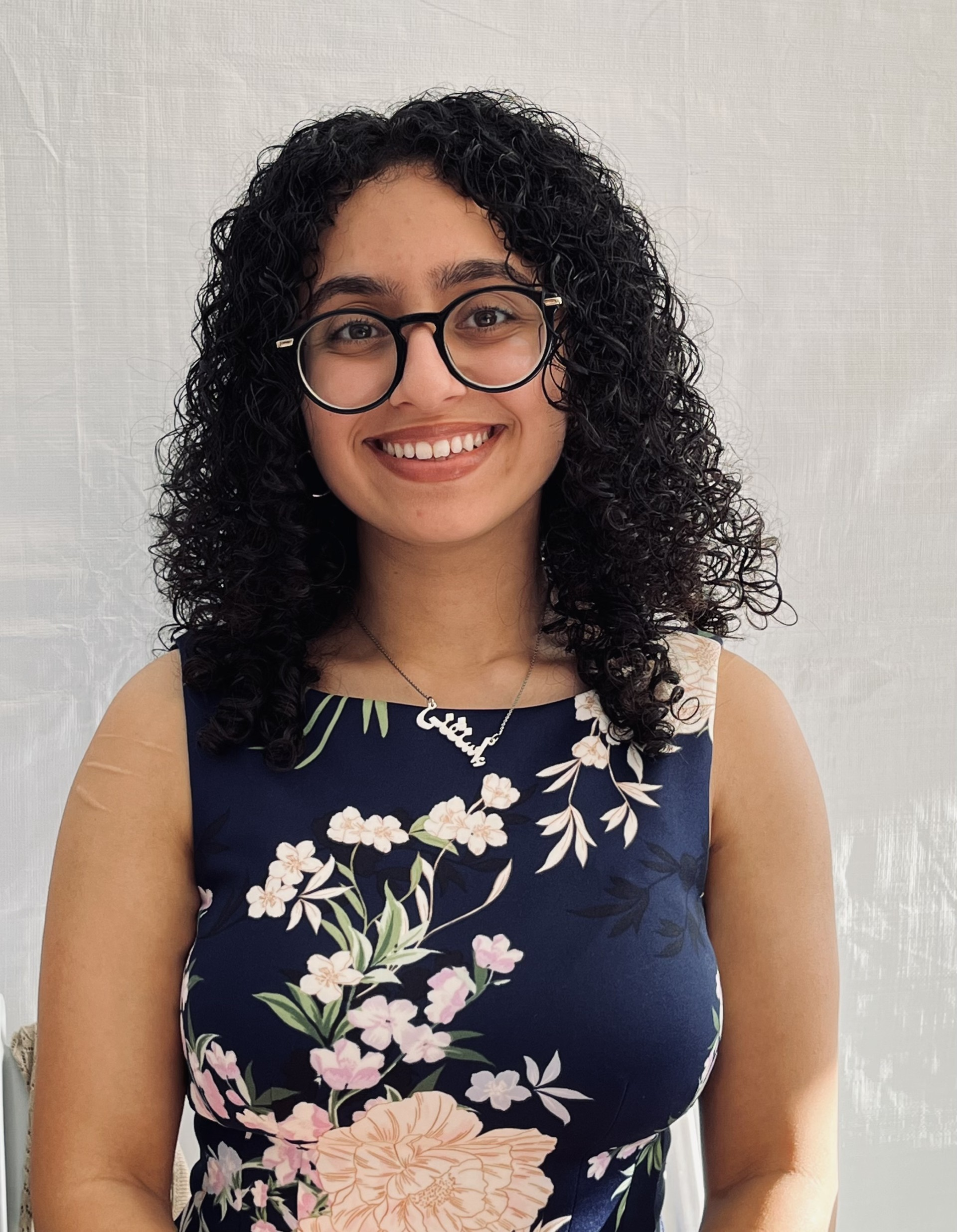 Research associate woman standing in front of blank background